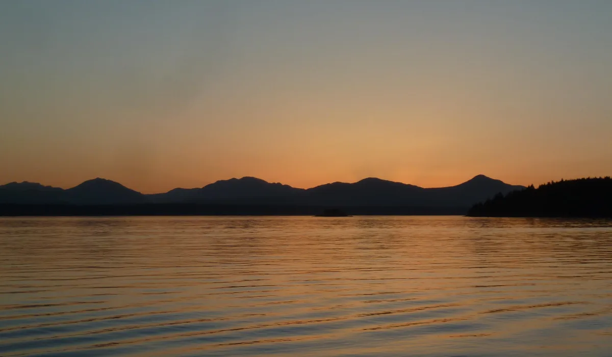 Sunset reflecting off calm waters near the Gulf Islands