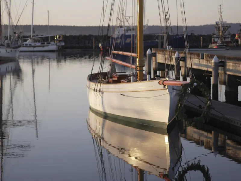 Early days of the company with the first yacht in Vancouver marina